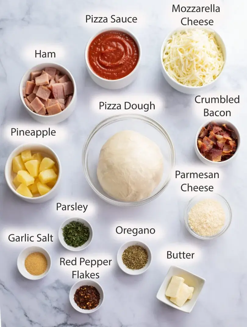 This image is bowls of ingredients that layout on a marble countertop, all these things are needed to make Ham and Pineapple Pizza Bites.